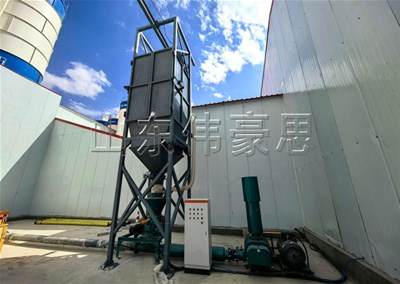 催化剂吨包自动拆包机的工作原理